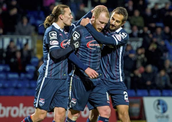 Liam Boyce celebrates after scoring a penalty to make it three for County. Picture: SNS