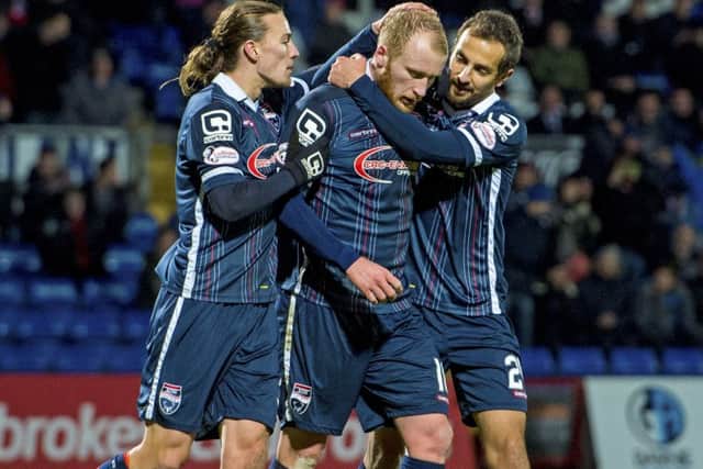 Liam Boyce celebrates after scoring a penalty to make it three for County. Picture: SNS
