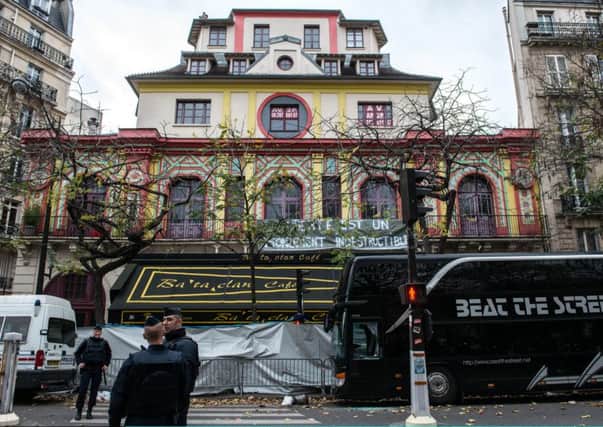 Police officers stand guard outside the Bataclan theatre in Paris. Picture: AFP/Getty