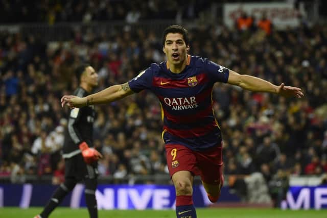 Luis Suarez celebrates after scoring . Picture: AFP/Getty