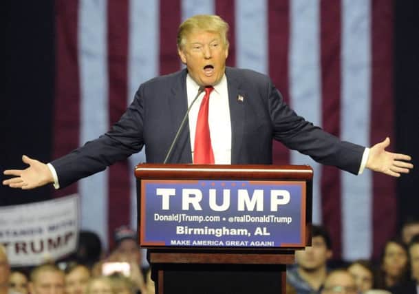 Donald Trump  said at a rally in Alabamba that he had trouble hearing the NBC reporters questions. Picture: AP