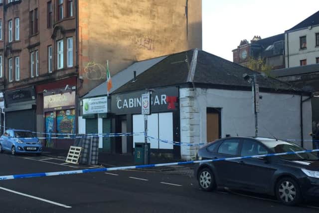 Police at the scene of the shooting in the Gallowgate. Picture: Lisa Ferguson