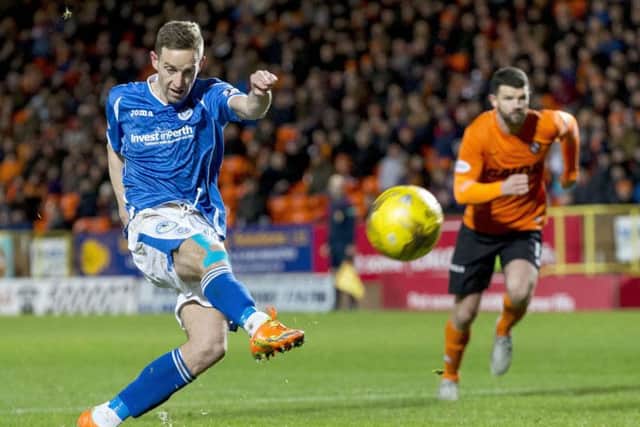 St Johnstone striker Steven MacLean fires wildly over the bar from the penalty spot after John Rankin had tripped Chris Kane in the box in the second half. Picture: SNS
