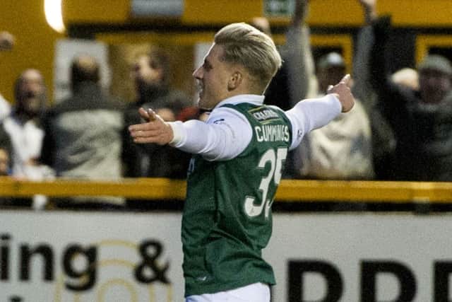 Jason Cummings celebrates after opening the scoring for Hibernian. Picture: SNS