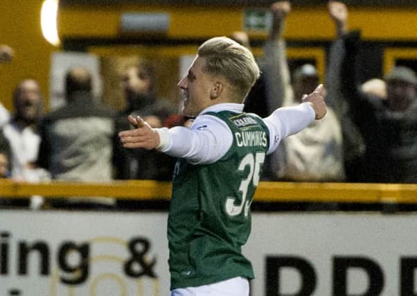Jason Cummings celebrates after opening the scoring for Hibernian. Picture: SNS
