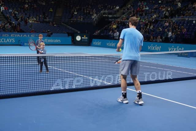 Andy Murray with Ashley Goodchild thanks to Make-A-Wish Foundation