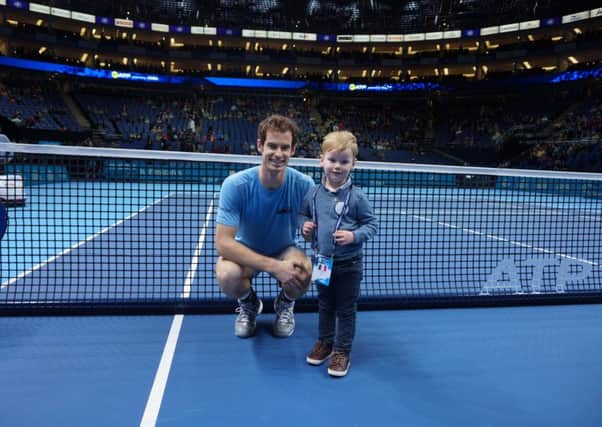 Andy Murray with Ashley Goodchild thanks to Make-A-Wish Foundation