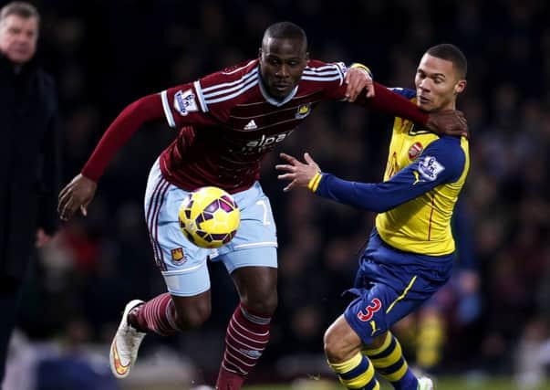 Guy Demel during his West Ham days battling with Kieran Gibbs. Picture: Getty