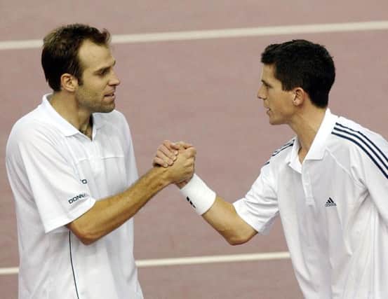 Greg Rusedski, left, and Tim Henman both reached No 4 in the world but they were unable to win a World Group match. Picture: PA