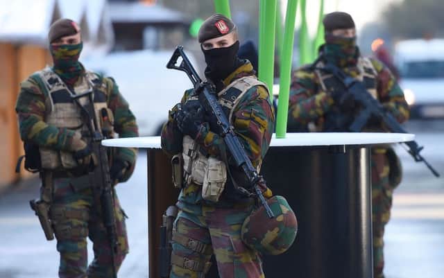 Soldiers patrol the streets as the Belgian capital remains on the highest possible alert. Picture: Getty