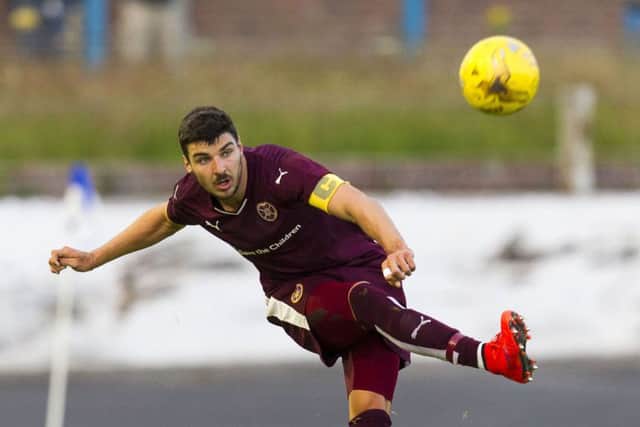 Full-back Callum Paterson believes sell-out crowds are a major factor in keeping players at Hearts. Picture: SNS