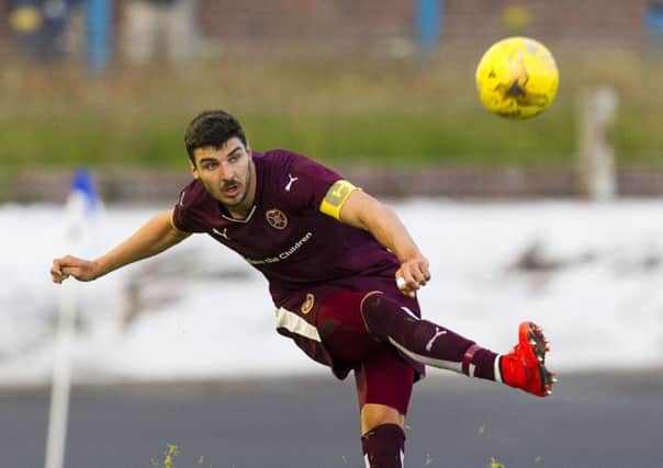 Full-back Callum Paterson believes sell-out crowds are a major factor in keeping players at Hearts. Picture: SNS