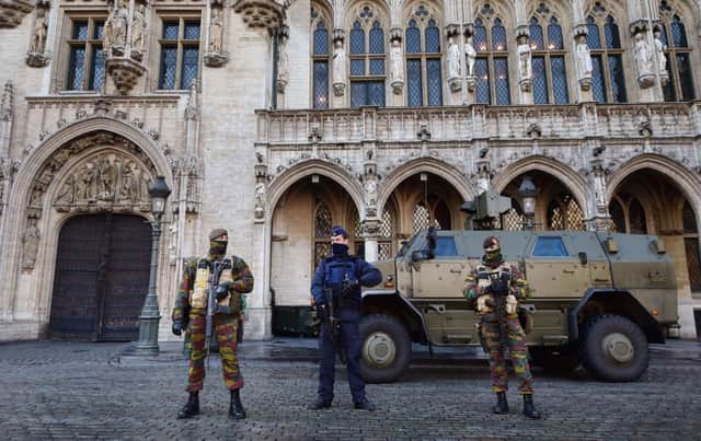 Soldiers and police patrol on Brussels' Grand Place as the Belgian capital remains on the highest possible alert level on November 23, 2015. Picture: Getty Images