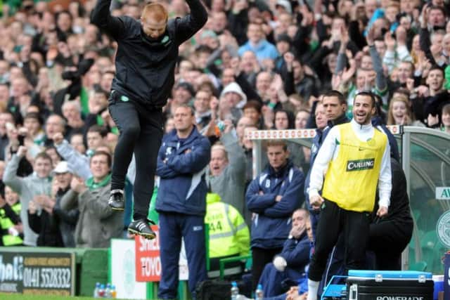 Neil Lennon celebrates on the touchline. Picture: Robert Perry