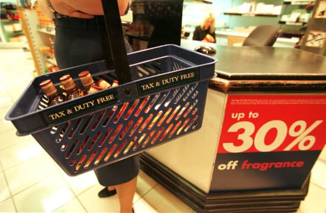 Alcohol bought at duty free shops could be sold in sealed bags across the UK, as some airports are already doing. Picture: TSPL