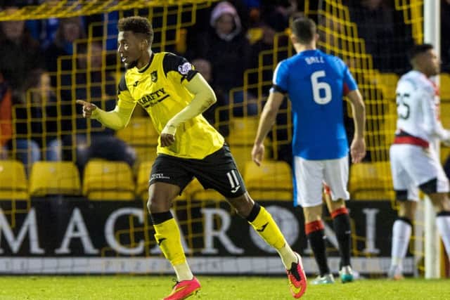 Livingston's Myles Hippolyte celebrates his equaliser against the league leaders. Picture: SNS