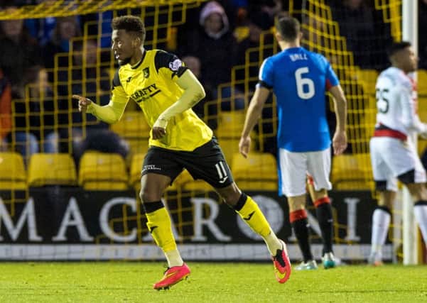 Livingston's Myles Hippolyte celebrates his equaliser against the league leaders. Picture: SNS