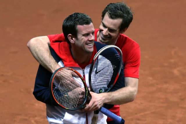 Andy Murray and GB captain Leon Smith in good spirits during practice in Ghent yesterday. Picture: PA