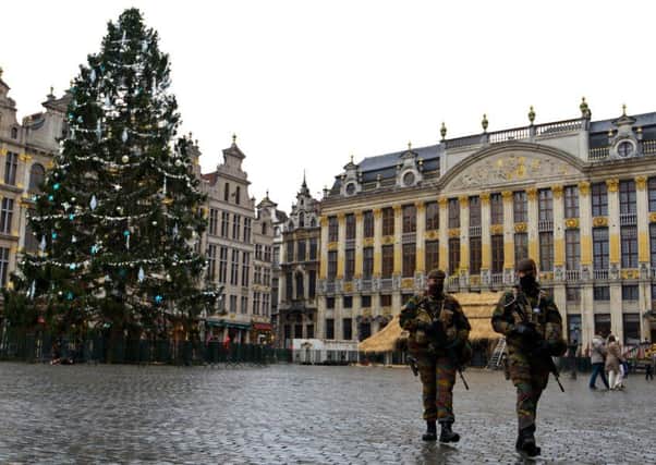 Armed soldiers patrol in Brussels. Events of the past tell us the Scotland is not immune from atrocities. Picture: Getty