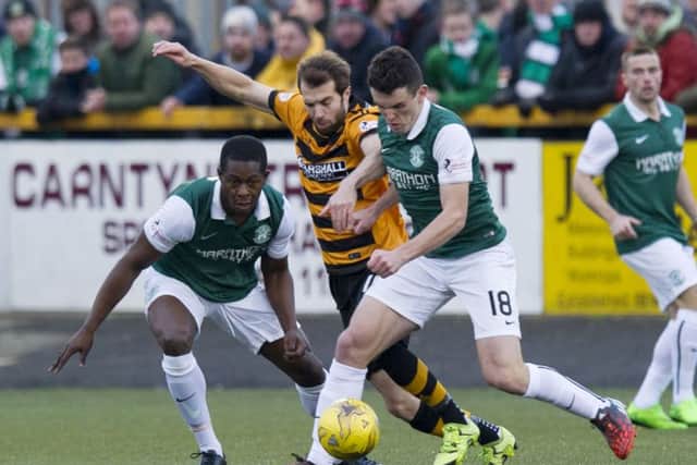 Hibernian's John McGinn gets his foot in against Alloa. Picture: SNS