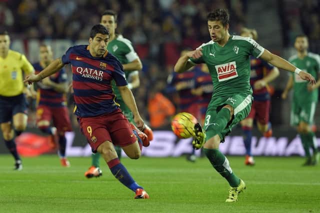 Was Aleksandar Pantic, seen here taking on Luis Suarez, one of the players watched by Celtic scouts? Picture: AFP/Getty