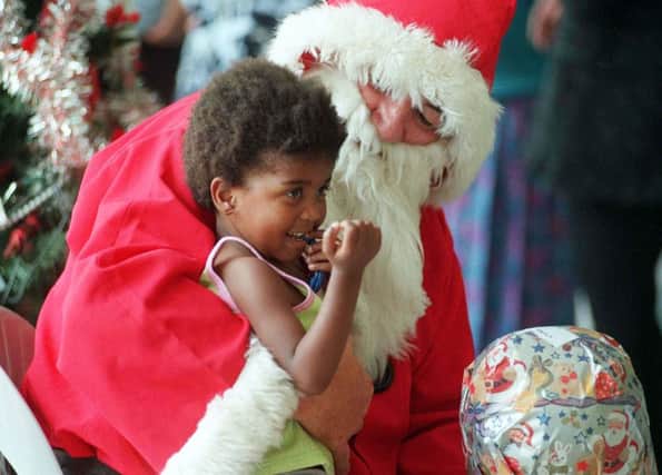 More than £3,000 is spent on Chrismtas presents for each child aged under 18, a survey says. Picture: AP