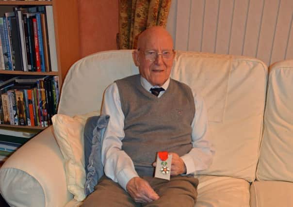 Don Mason with his medal from France. Picture: John Jeffay