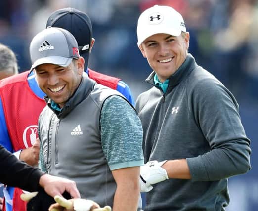 Jordan Spieth, right, was put on the clock in this years Open Championship at St Andrews while playing with Sergio Garcia, left. Picture: Ian Rutherford