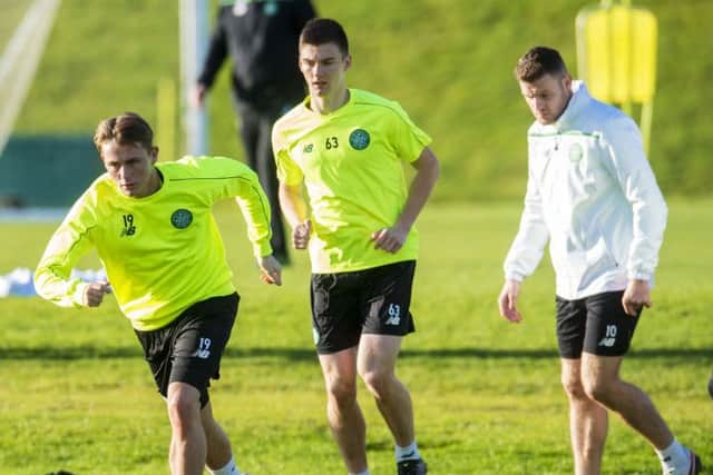 Scott Allan, Kieran Tierney and Anthony Stokes train ahead of tonight's game against Ajax. Picture: SNS