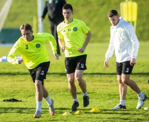 Scott Allan, Kieran Tierney and Anthony Stokes train ahead of tonight's game against Ajax. Picture: SNS