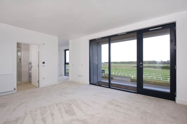 The expansive living area with views on to the racecourse