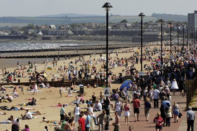A crowded Portobello beach, as 2015 is on track to be the hottest year on record. Picture: Phil Wilkinson