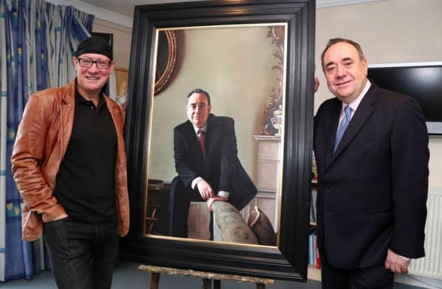 Gerard M Burns, left with Alex Salmond MP and the portrait. Picture: Scottish Government / Flickr