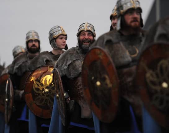 Shetlanders dressed as vikings march through the streets of Lerwick in 2011 during the Up Helly Aa festival. Picture: Robert Perry