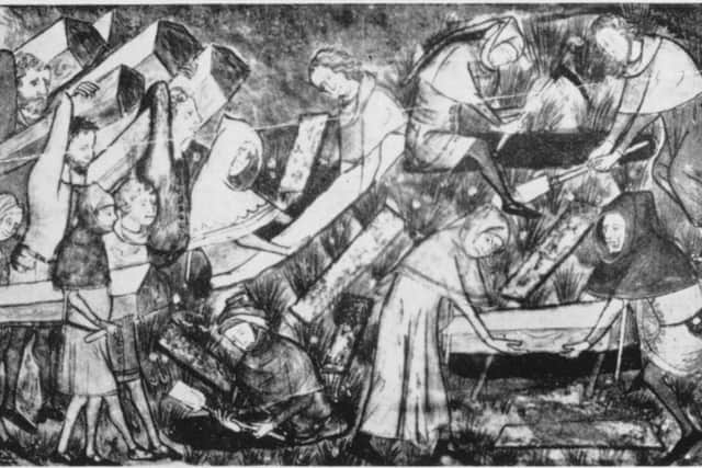 Victims of the Black Death being buried . Picture: Getty
