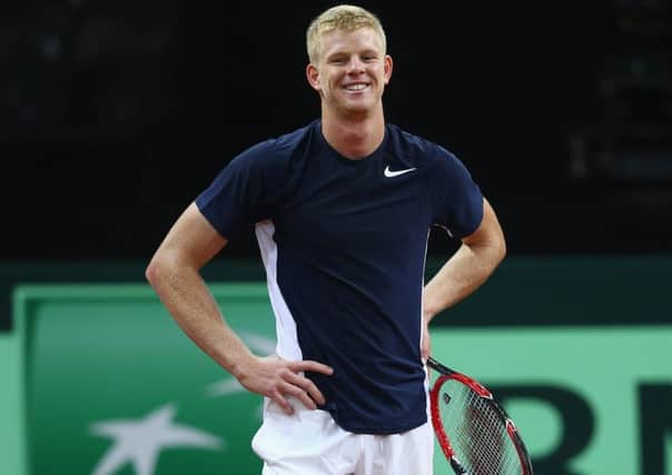 Team GB's Kyle Edmund in good spirits during a practice session ahead of the start of the Davis Cup final. Picture: Getty Images