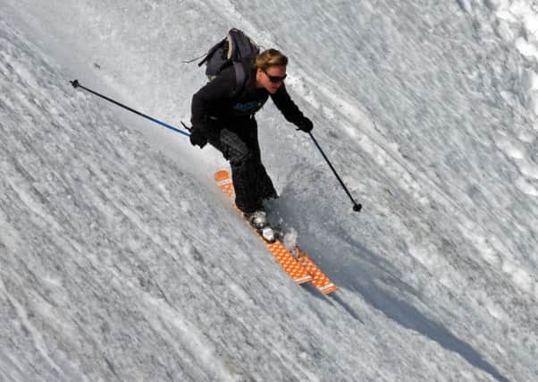 A skier descends on The Flypaper at Glencoe