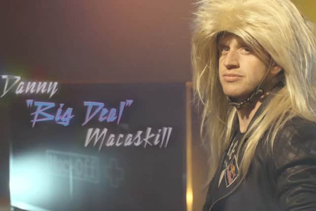 Danny MacAskill in hair metal attire