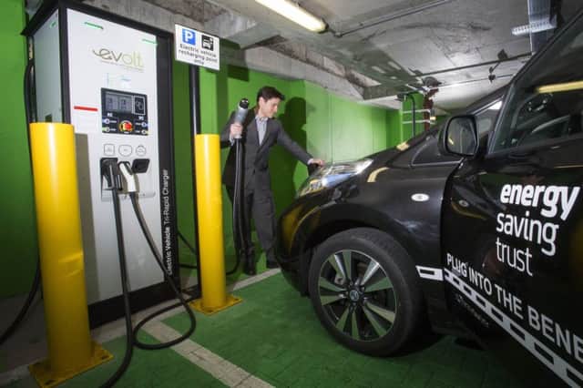Homes that buy an electric car can get a grant for a home charging point. Picture: Steven Scott Taylor