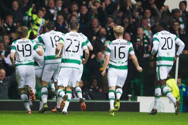 The Celtic players celebrate after McGregor's opener - it was all down hill from there. Picture: John Devlin