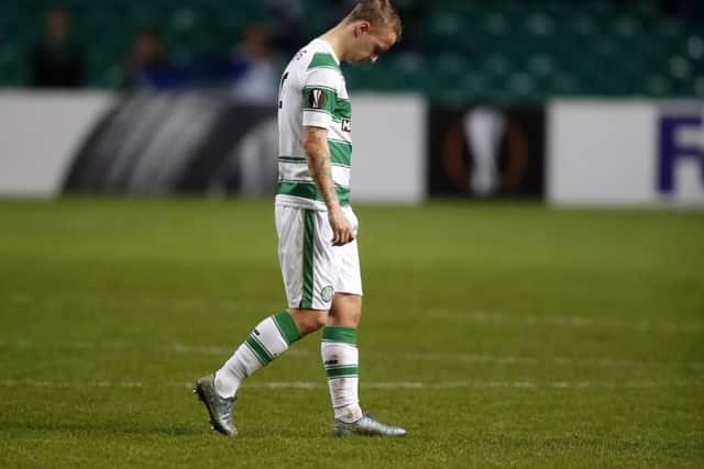 Leigh Griffiths is dejected at the final whistle. Picture: PA