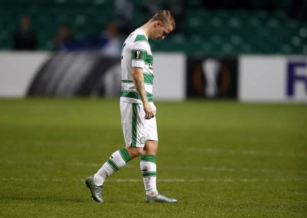 Leigh Griffiths is dejected at the final whistle. Picture: PA