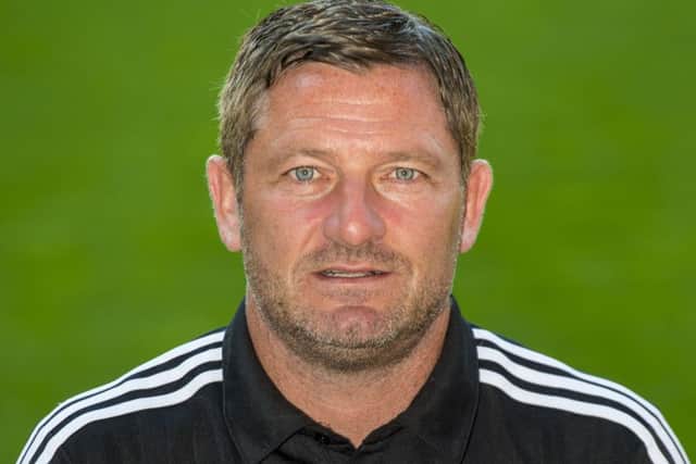 Aberdeen assistant Tony Docherty is good friends with County management duo. Picture: SNS Group
