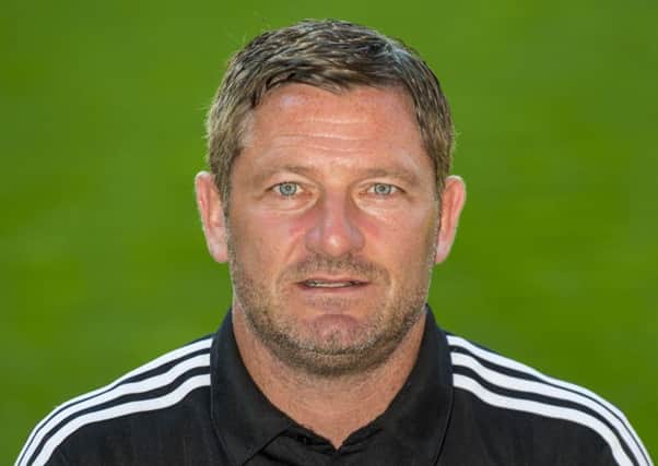 Aberdeen assistant Tony Docherty is good friends with County management duo. Picture: SNS Group