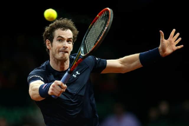 Andy Murray on his way to a three-set win over Belgium's Ruben Bernelmans on day on of the Davis Cup final. Picture: Getty Images