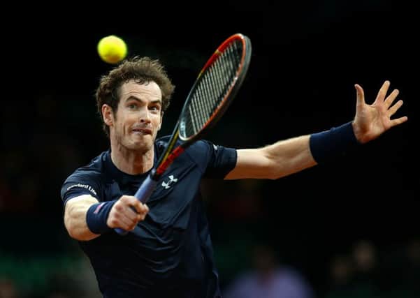 Andy Murray on his way to a three-set win over Belgium's Ruben Bernelmans on day on of the Davis Cup final. Picture: Getty Images