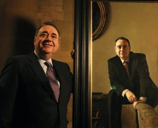 Alex Salmond unveils a portrait of himself at the Scottish National Portrait Gallery in Edinburgh. Picture: PA