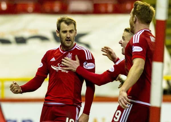 Aberdeen's Niall McGinn (left) celebrates his goal. Picture: SNS
