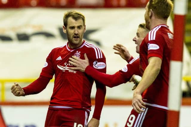 Aberdeen's Niall McGinn (left) celebrates his goal. Picture: SNS