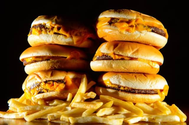 Portion sizes, especially in fast food-style dishes, raise fat levels. Picture: PA